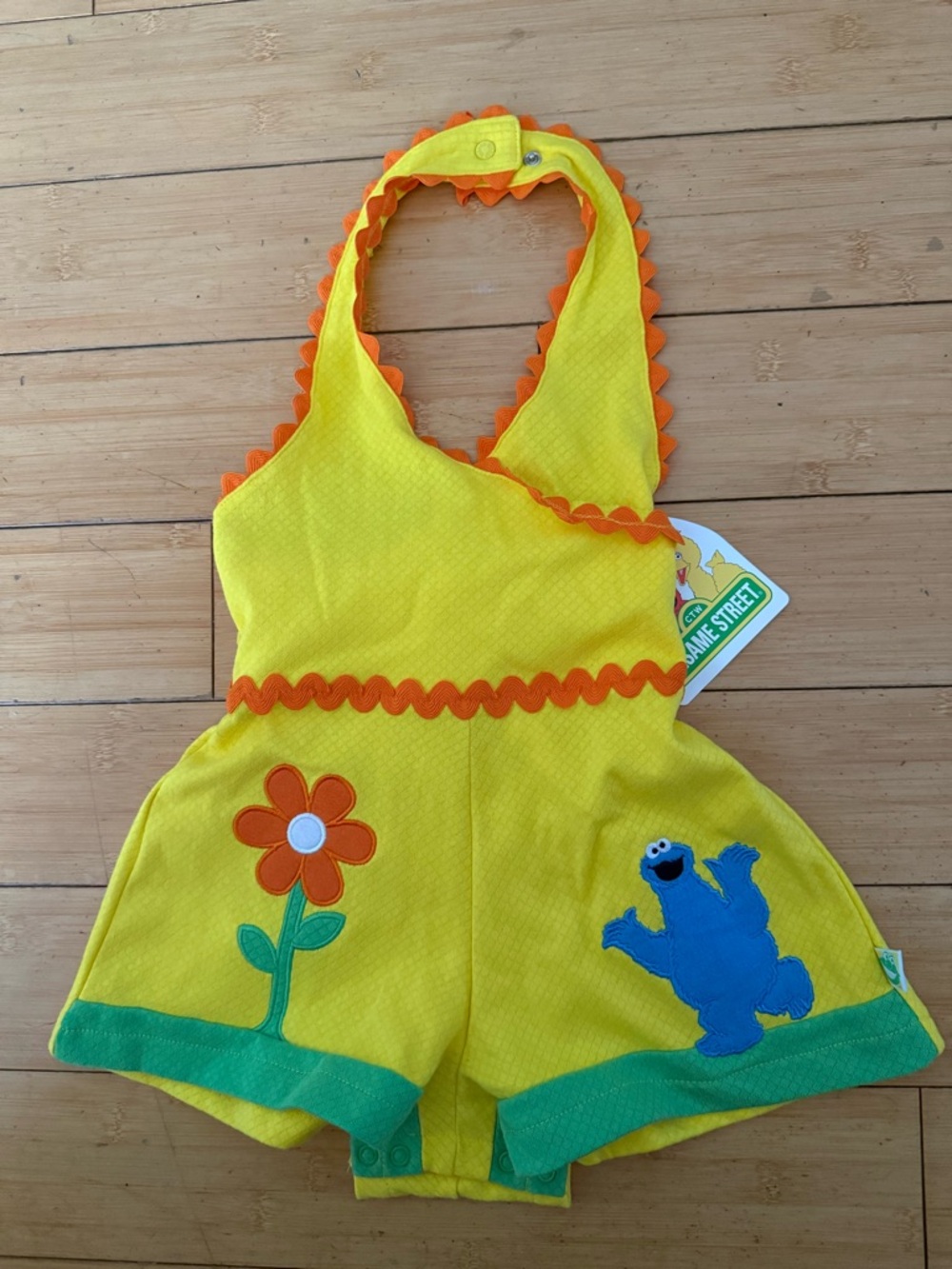Sesame Street Yellow Romper with Orange Trim and Cookie Monster Appliqué
